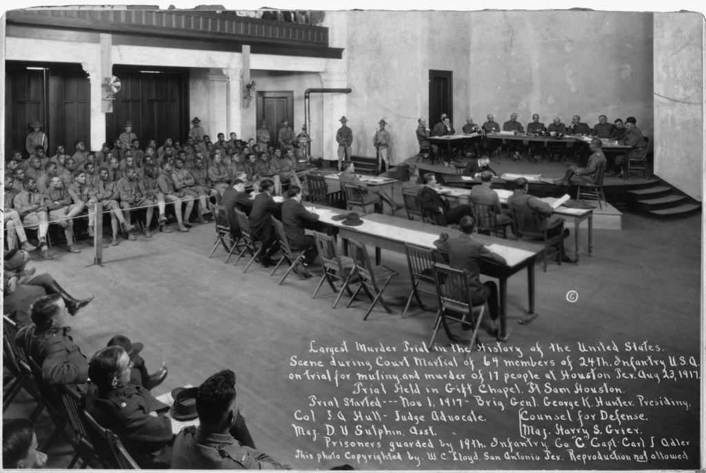 A historic black and white image of a court martial